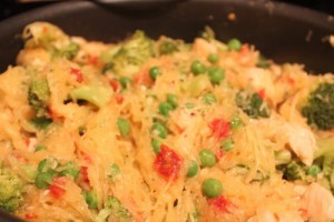 Spaghetti squash with grilled chicken, sundried tomatoes, broccoli, and peas