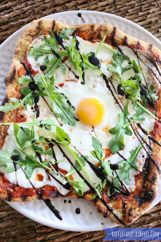 Grilled pizza with egg arugula and balsamic